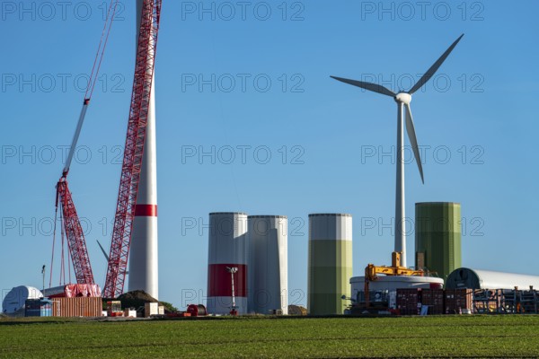 Construction site of a new wind turbine, modules of the tower, wind turbine from the manufacturer