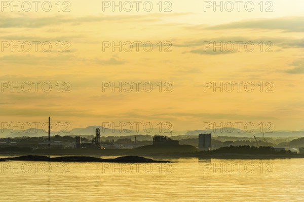 Sunrise of Industrial Zone over FjordSailing, Stavanger, Boknafjorden, Norway, Europe