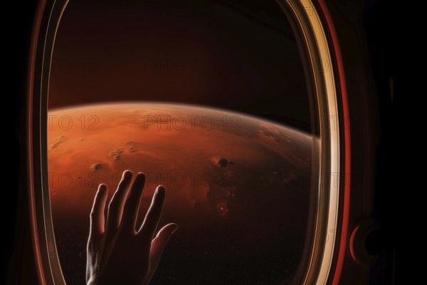 Mars landscape seen through spaceship window illuminator with astronaut hand touching the glass.