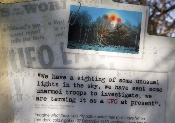 Newspaper headline reports on notice sign at Rendlesham UFO trail, Rendlesham forest, Suffolk,