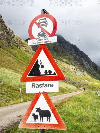Mountain road from Haukland beach to Uttakleiv, warning signs, no public traffic, be aware of sheep