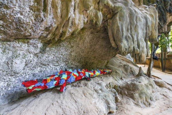Hiking trail with stuffed animals as sculptures at Phra Nang beach near Krabi, symbol, religion,