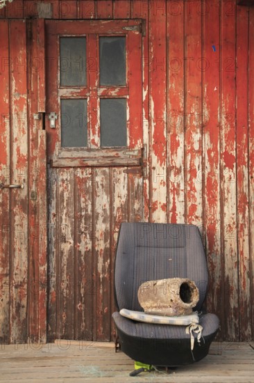 Car seat as seating, old fishermen's huts in Armacao de Pera, Algarve, Portugal, Europe