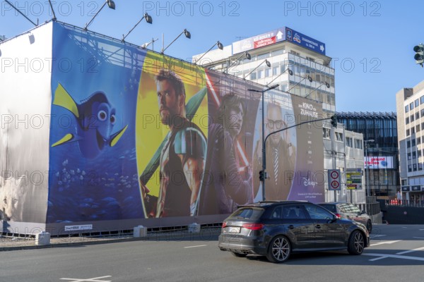 Advertising, large poster, for the new streaming service Disney Plus, in Düsseldorf