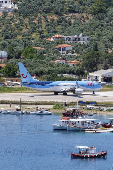 A TUI Airways Boeing 737-800 aircraft with the registration G-TAWD at Skiathos Airport, Greece,