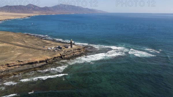 Aerial view of lighthouse Faro Punta de Jandia at southern tip of peninsula Jandia, in the