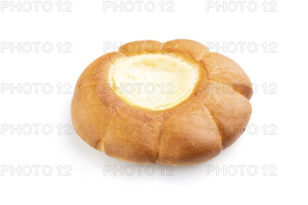 Sour cream bun isolated on white background. Side view, close up