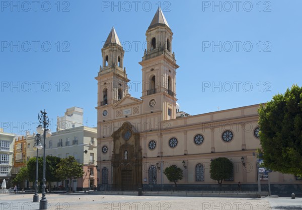 Historic church with two bell towers under a blue sky, Iglesia de San Antonio, Plaza de San