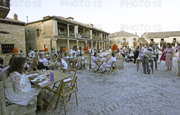 Plaza Mayor in the evening for the Conciertos de las Velas festival of lights, Pedraza, province of