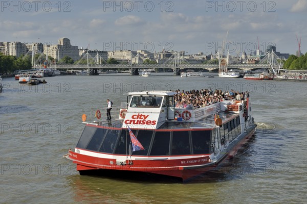 Sightseeing boat on the Thames near Westminster Bridge, London, England, United Kingdom, Europe