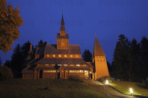 Night shot of the Gustav-Adolf-Stabkirche, twilight, blue hour, wooden church, lighting,