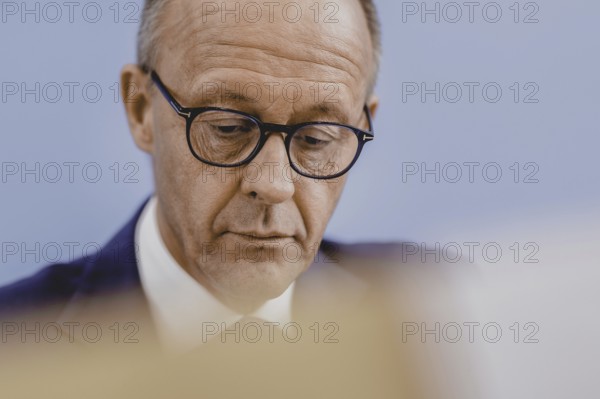 Friedrich Merz, CDU party chairman, at the Federal Press Conference on the consequences of Solingen