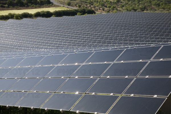 Array of photovoltaic solar panels in Mediterranean sunshine, near Alhama de Granada, Spain, Europe