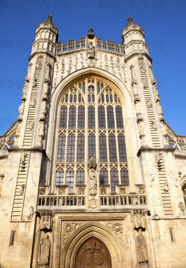 Angels and ascending and descending on ladders frontage, Abbey church, Bath, Somerset, England,