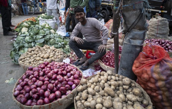 Vendor selling vegetables at a market, ahead of the presentation of the Interim Budget 2024 by
