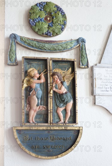Painted plaster angels in village parish church of Saint Michael, Wilsford cum Lake, Wiltshire,