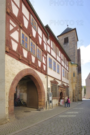 Restaurant Haus zum Güldenen Krönbacken and St Michael's Church, half-timbered house, archway,