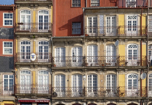 Colorful facades of houses along Cais da Estiva in the Ribeira district, Porto, Portugal, Europe