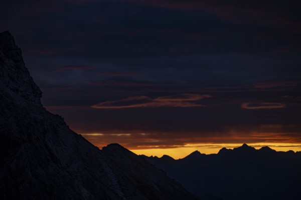 Montafon mountains with dramatic cloudy sky at sunrise, Tschagguns, Rätikon, Montafon, Vorarlberg,