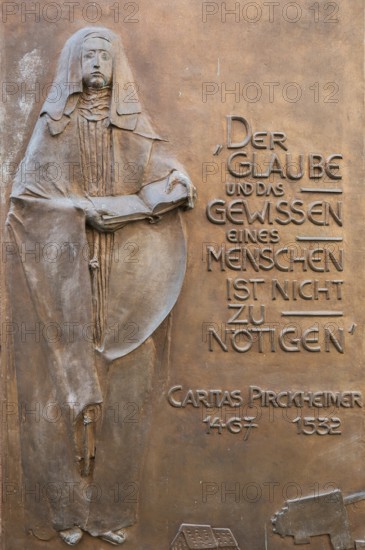 Detail of the memorial plaque at the grave site of the humanist Carita Pirkheimer, former monastery