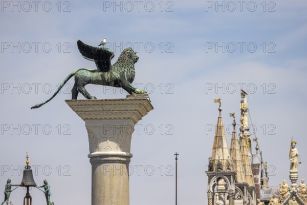 View of the city from the Canale della Giudecca, granite column on St Mark's Square with the Lion