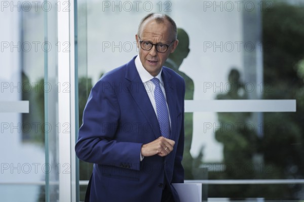 Friedrich Merz, CDU party chairman, at the Federal Press Conference on the consequences of Solingen