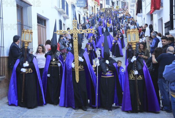 Easter Christian religious procession through streets of Setenil de las Bodegas, Cadiz province,
