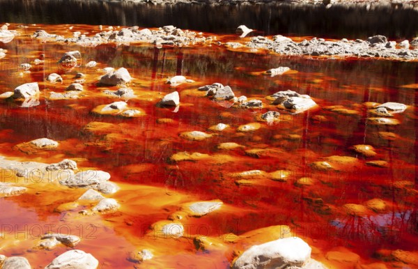 Blood red mineral laden water Rio Tinto river Minas de Riotinto mining area, Huelva province,