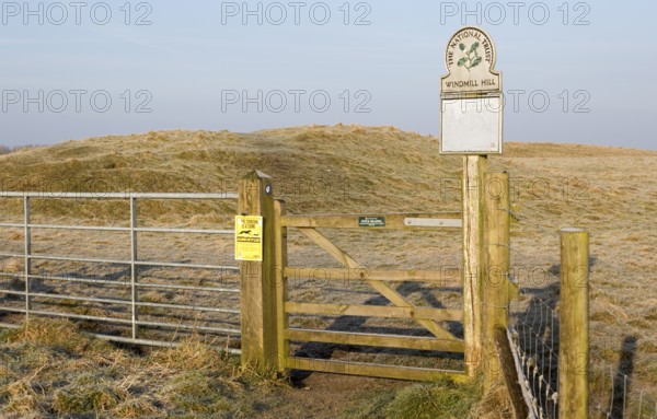 National Trust sign at gateway entrance to Windmill Hill, a Neolithic causewayed enclosure, near