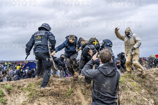 Violent clashes between thousands of demonstrators and the police, after a demonstration against