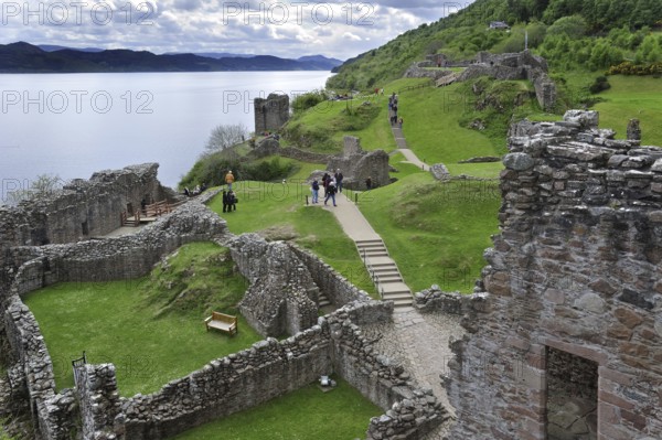 The ruins of Urquhart Castle beside Loch Ness near Drumnadrochit, Scotland, UK