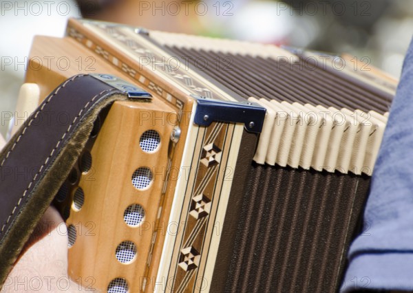 Man Playing on an Accordion