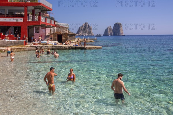 Marina Piccola bay on the south coast with the Faraglioni rocks, the island's landmarks, Capri,