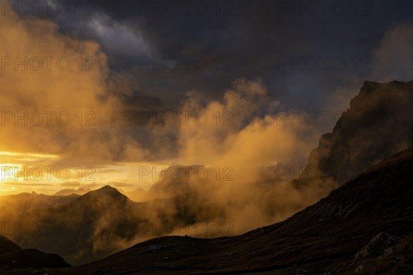 Montafon mountains with dramatic cloudy sky at sunset, Tschagguns, Rätikon, Montafon, Vorarlberg,