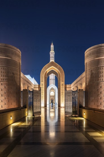 Sultan Qaboos Grand Mosque, illuminated archway with minaret, Muscat, Oman, Asia