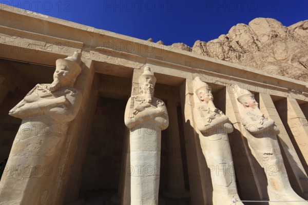 Part of the temple complex, statues of Hatshepsut at the mortuary temple of Hatshepsut, Hatshepsut