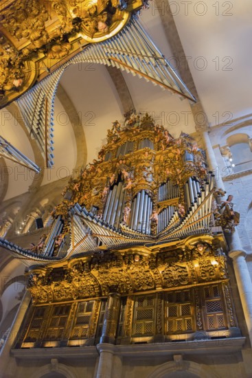 Magnificent baroque organ with detailed carvings and golden decorations, cathedral, Santiago de