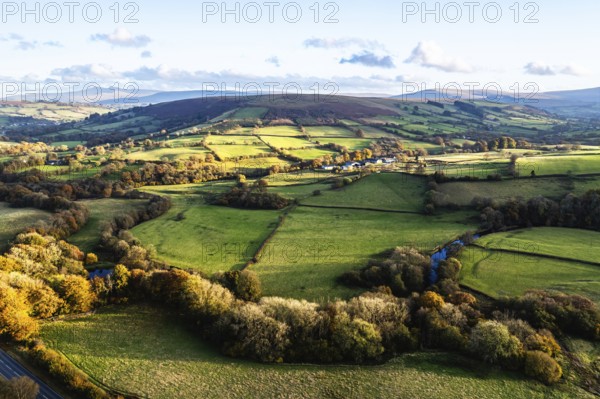 Farms over Trecastle from a drone at sunset, Brecon Beacons National Park, Powys, Wales, England,