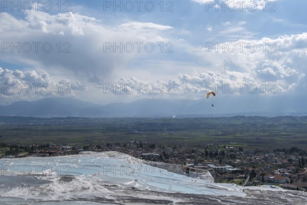 Sintered limestone terraces of Pamukkale, tandem paragliding, Pamukkale, Denizli province, Aegean