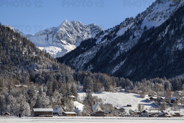 Winter landscape in the snow, behind St, Loretto and mountains of the Allgäu Alps, Oberstdorf,