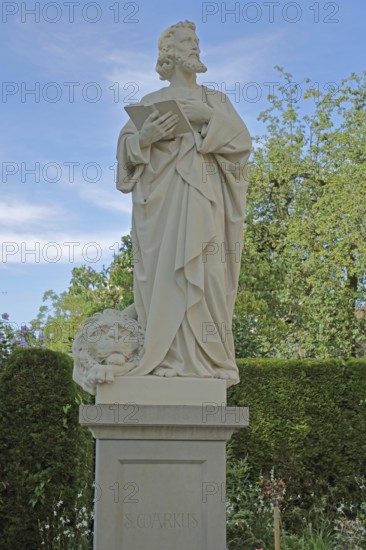 Sculpture of St Mark the Apostle with Bible, Saint, UNESCO St Mary and St Mark's Church, Minster,