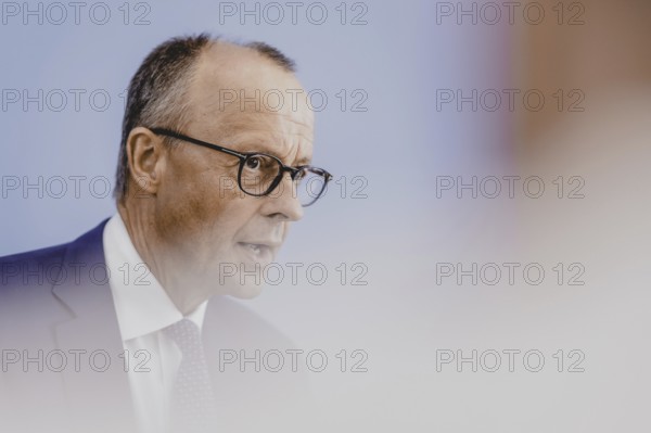 Friedrich Merz, CDU party chairman, at the Federal Press Conference on the consequences of Solingen