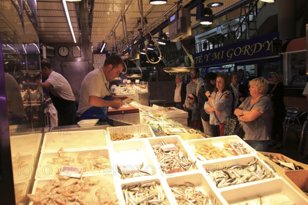 Inside mercado market fresh fish food stalls, La Latina, Madrid city centre, Spain, Europe