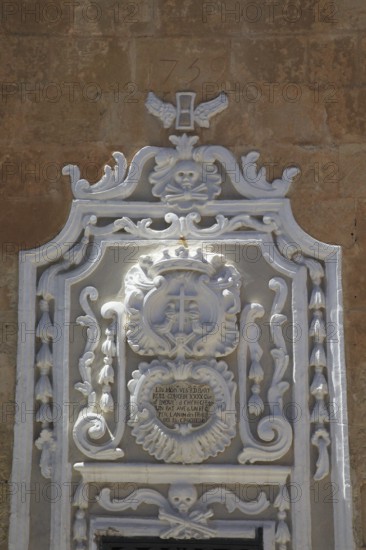 Historic plasterwork detail of religious monument Franciscan Church of St Mary of Jesus, Valletta,