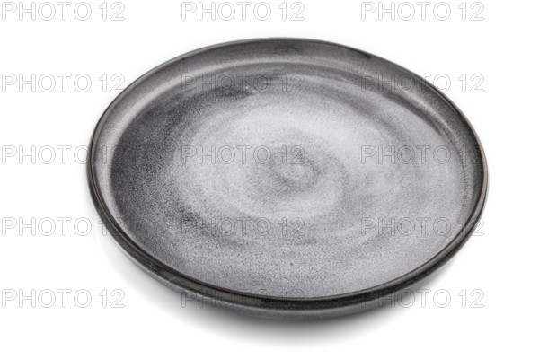 Empty gray ceramic plate isolated on white background. Side view, close up