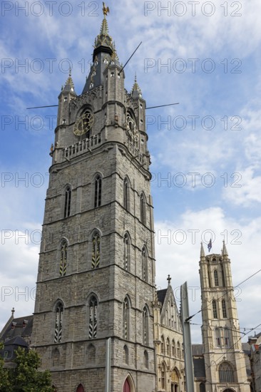 Belfry, and tower of St Bavo's Cathedral, also Sint-Baafskathedraal (behind), UNESCO World Heritage