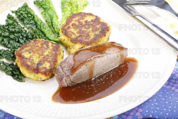 Swabian cuisine, medallions of wild boar with savoy cabbage cakes, meat dish, roasted, hearty, home