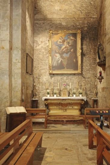 Chancel with altar and painting of the Romanesque church, interior view, Notre-Dame-de-Nazareth,