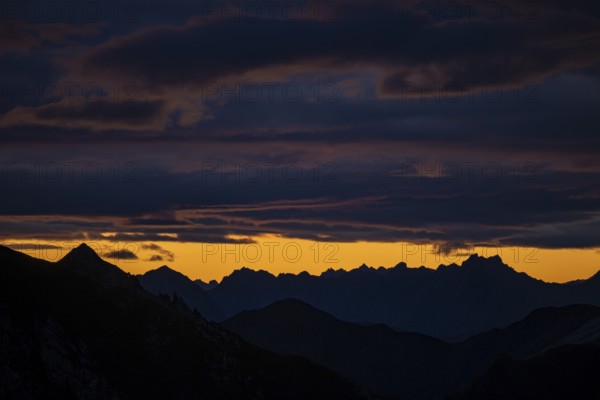 Montafon mountains with dramatic cloudy sky at sunrise, Tschagguns, Rätikon, Montafon, Vorarlberg,