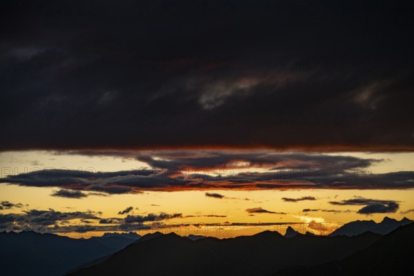 Montafon mountains with dramatic cloudy sky at sunset, Tschagguns, Rätikon, Montafon, Vorarlberg,